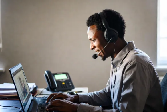 Person experiencing poor VoIP call quality during an online meeting