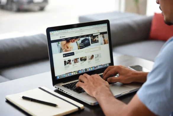 Person running an online store from a laptop at home