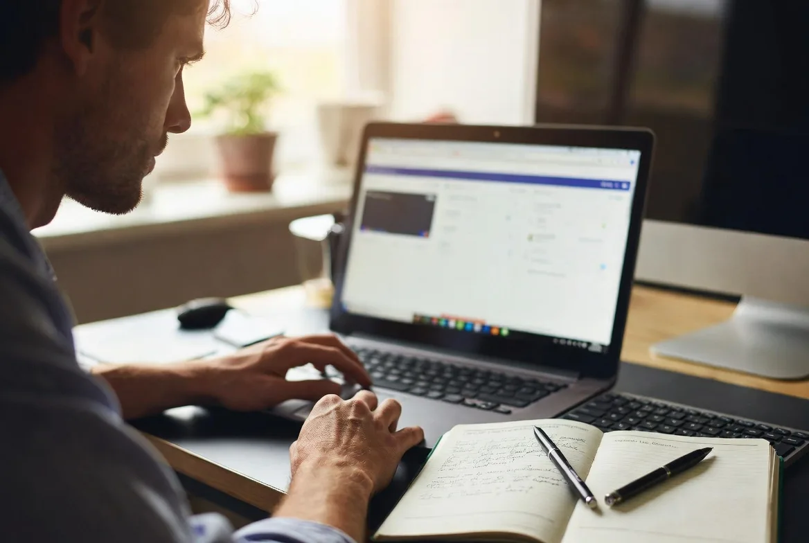 comparing help desk software platforms on laptop