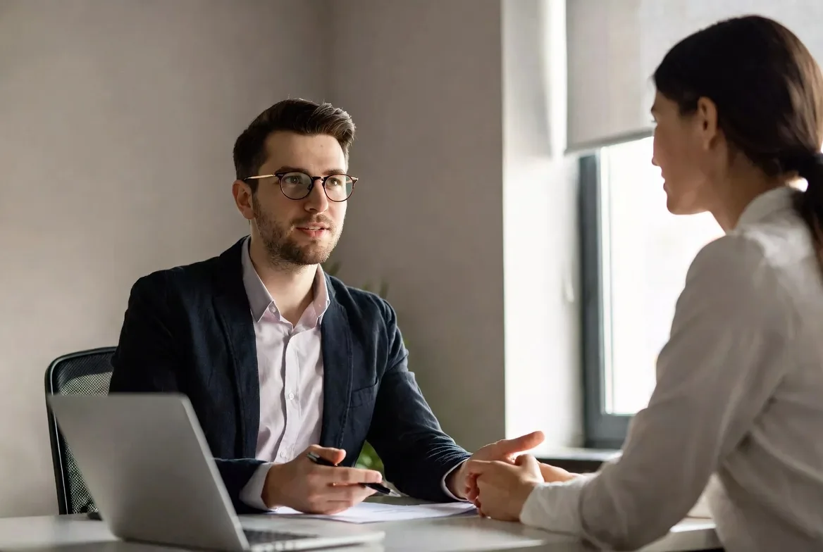 IT technician explaining a solution to a user in simple terms