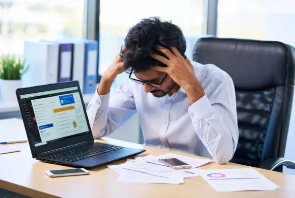 overwhelmed business owner dealing with IT support issues