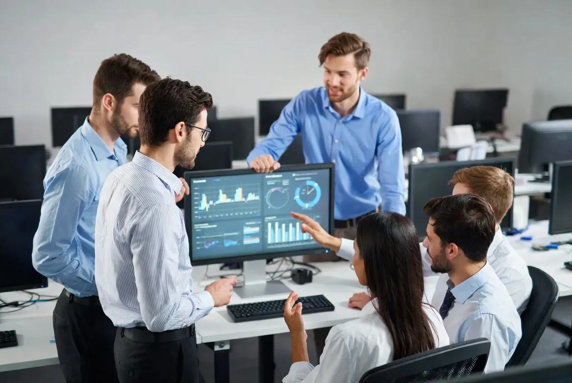 IT team analyzing help desk performance and improving support operations